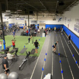 Wide angle view of the Infinity Fitness AZ gym floor.