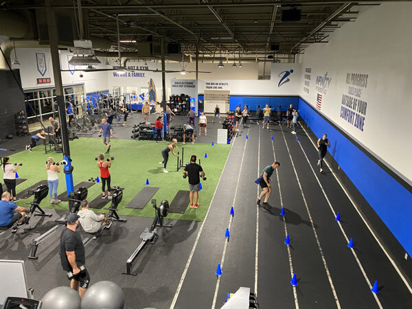 Wide angle view of the Infinity Fitness AZ gym floor.